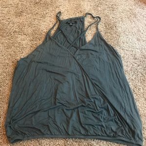 Cross over tank with accent straps